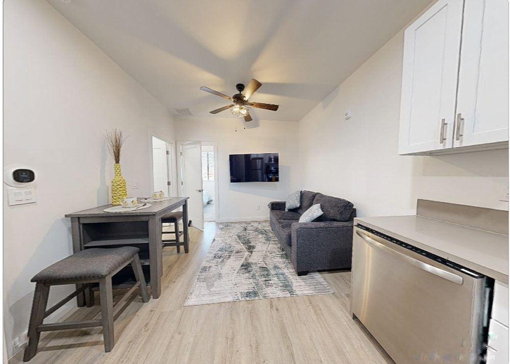 Compact living space with sofa and TV