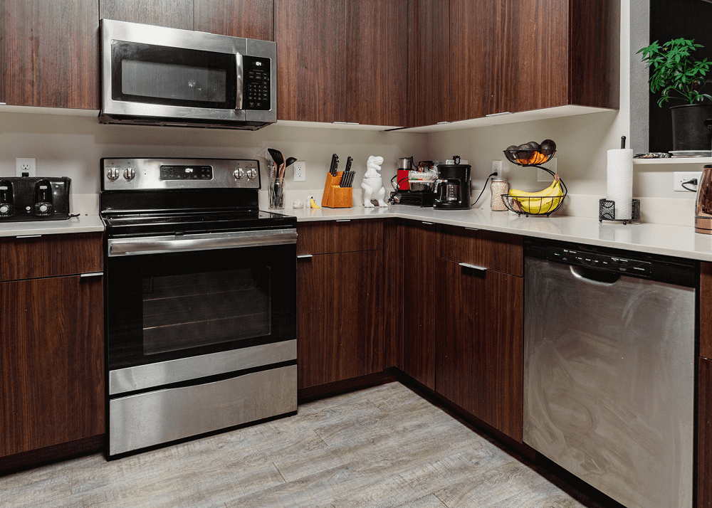 Contemporary kitchen corner with wooden cabinets